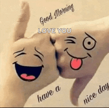 a couple of hands with smiley faces drawn on them and the words `` good morning love you '' .