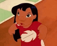 a cartoon character is wearing a red shirt with a white feather on it .