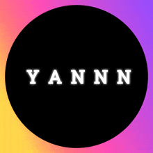 a black circle with yann written in white letters