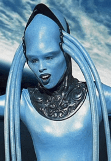 a statue of a blue alien with a black collar and long blue hair