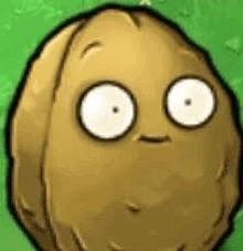 a cartoon potato with big eyes and a face is standing on a green field .