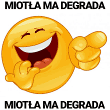 a smiley face with the words miotla ma degrada written below it