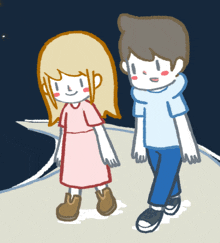 a boy and a girl standing next to each other