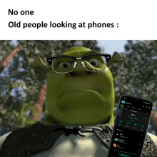 shrek wearing glasses next to a phone that says ' no one old people looking at phones ' on it