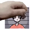 a pixel art of a hand holding a picture of a boy .