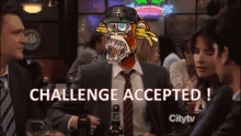 a man in a suit and tie holds a bottle of beer in front of a challenge accepted sign