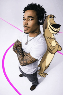 a man wearing headphones stands next to a cartoon character