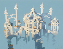 a minecraft model of a castle with a blue sky behind it