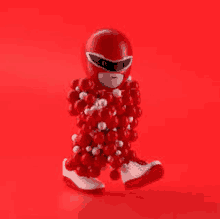 a red power ranger is made of red balls .