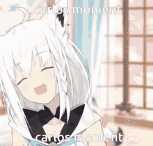 a cartoon girl with white hair and a cat ear is smiling and says carlos moment