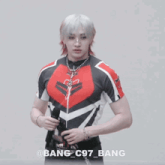 a man in a red and black shirt has the name bang on the bottom