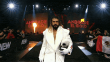 a wrestler named andrade el idolo walks down a ramp