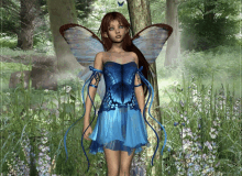 a fairy in a blue dress is standing in the grass