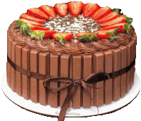 a chocolate cake with strawberries on top and a brown ribbon