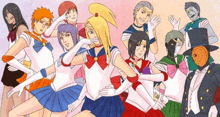 a group of people dressed as sailor moon from naruto are standing next to each other .