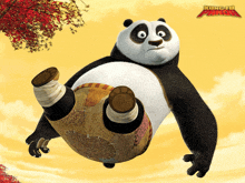 a kung fu panda bear is laying on its back