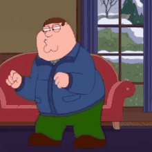 peter griffin from family guy is dancing in front of a couch