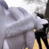 a close up of a white object that looks like a sheep