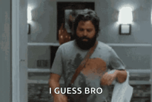a man with a beard is saying i guess bro