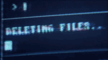 a computer screen displays the words " deleting files " on it