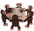 a group of stuffed monkeys are dancing around a square with a woman 's face on it