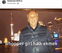 a man is standing in front of a city skyline and the caption says " whopper girl halk ekmek "