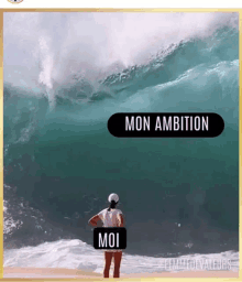 a woman standing in front of a large wave with a sign that says mon ambition on it