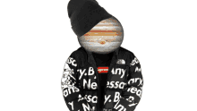 a person wearing a black beanie and a black jacket with the word supreme on it