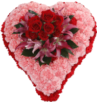 a heart made of pink and red flowers with red roses