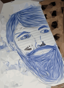 a drawing of a man with blue hair and a beard on a piece of paper