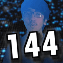 a man with glasses and the number 144 in white letters