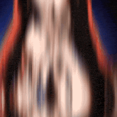 a blurred image of a person 's face with a blue sky in the background