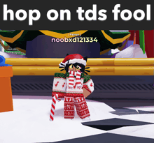 a screenshot of a video game with the words hop on tds fool on the top