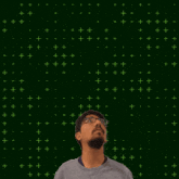 a man looks up at the number 20 + 13