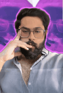 a man with glasses and a beard is smoking a cigarette in front of a purple background