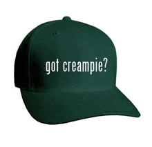 a green baseball cap says got creampie in white letters