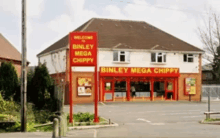 a binley mega chippy restaurant with a welcome sign