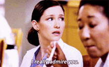 a woman in a lab coat says " i really admire you " next to another woman