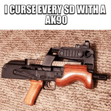 a gun with a wooden grip is sitting on a carpet with a caption that says i curse every sd