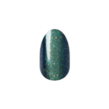 a close up of a nail with a blue and green gradient