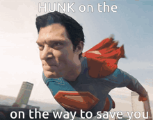 superman is flying through the air with the words hunk on the way to save you below him