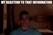 a man in a blue shirt is looking at the camera with the caption my reaction to that information .