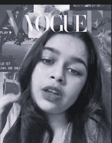 a black and white photo of a woman with the word vogue on it