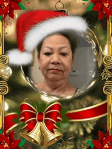 a woman wearing a santa hat is in a christmas photo frame