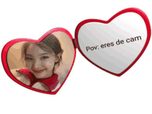 a heart shaped mirror with a picture of a woman and the words pov eres de cam on it