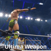 a wrestler in a ring with the words ultima weapon on the bottom