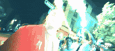 a gif from gifrun.com shows a man walking down a street