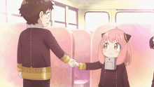 a boy and a girl shake hands in a cartoon