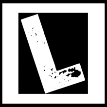 a black and white image of a letter l with a splash of paint on it .