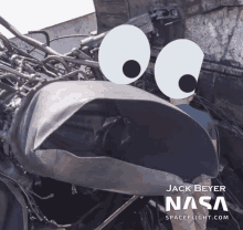 a jack beyer nasa spaceflight.com poster with a cartoon face